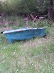 An old kicker boat. In a final resting place.